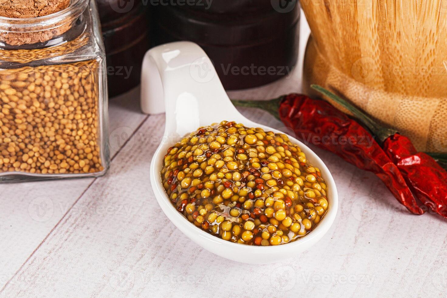 Spicy mustard sauce with seeds photo