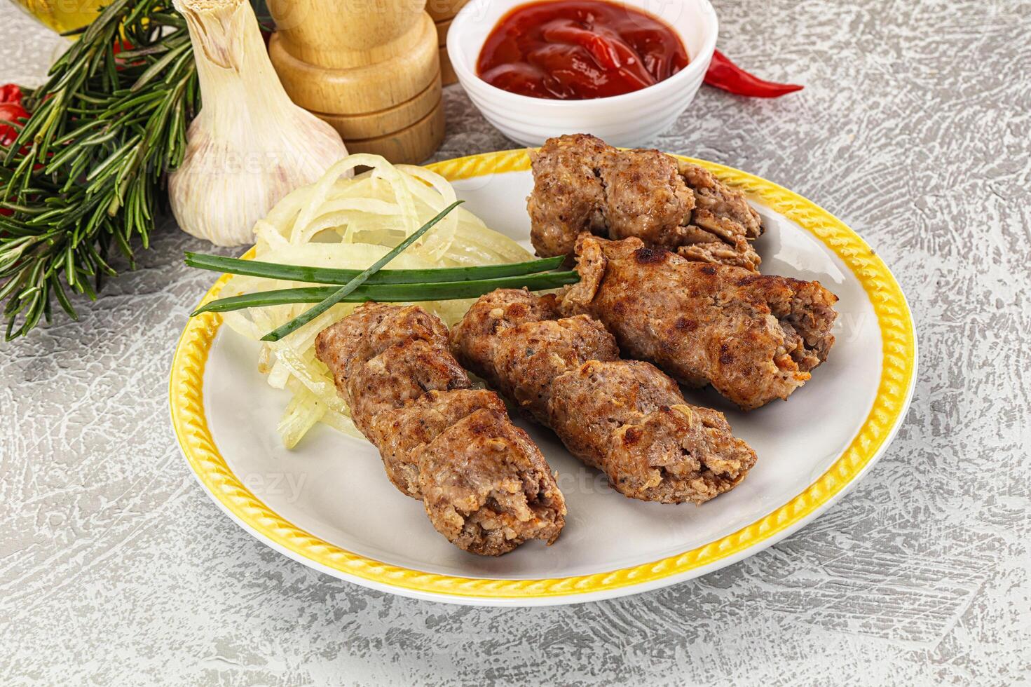 Beef kebab minced meat with onion photo