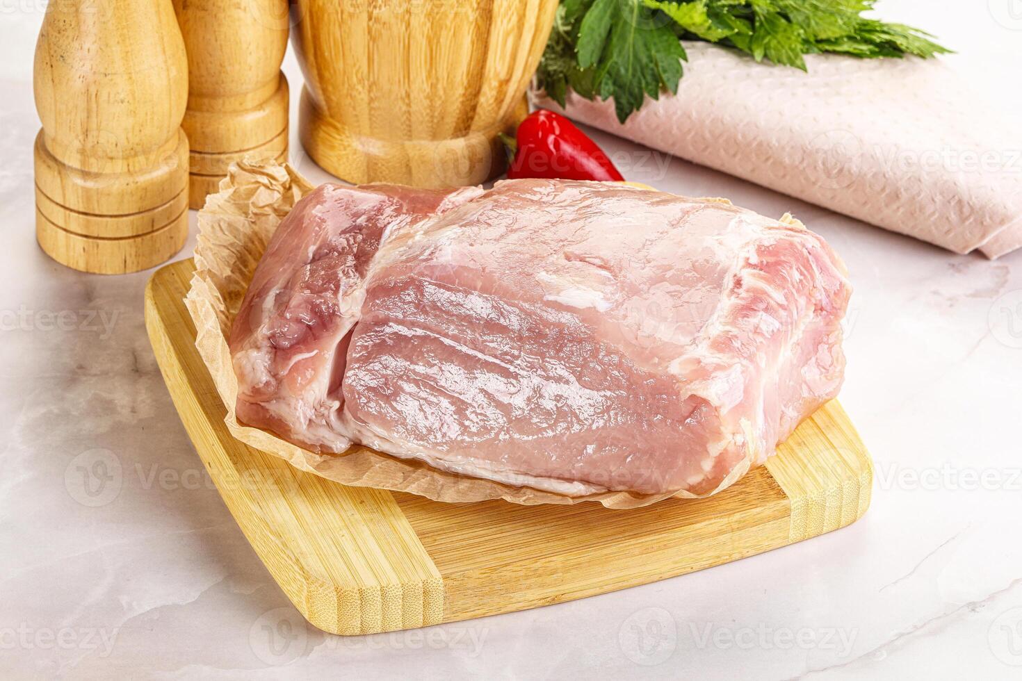 Raw uncooked pork meat loin photo