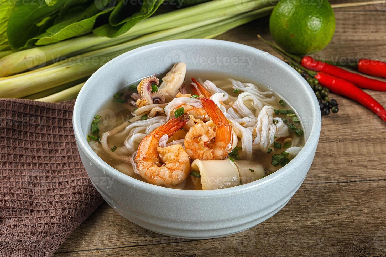 Vietnamese Pho Bo soup with seafood photo