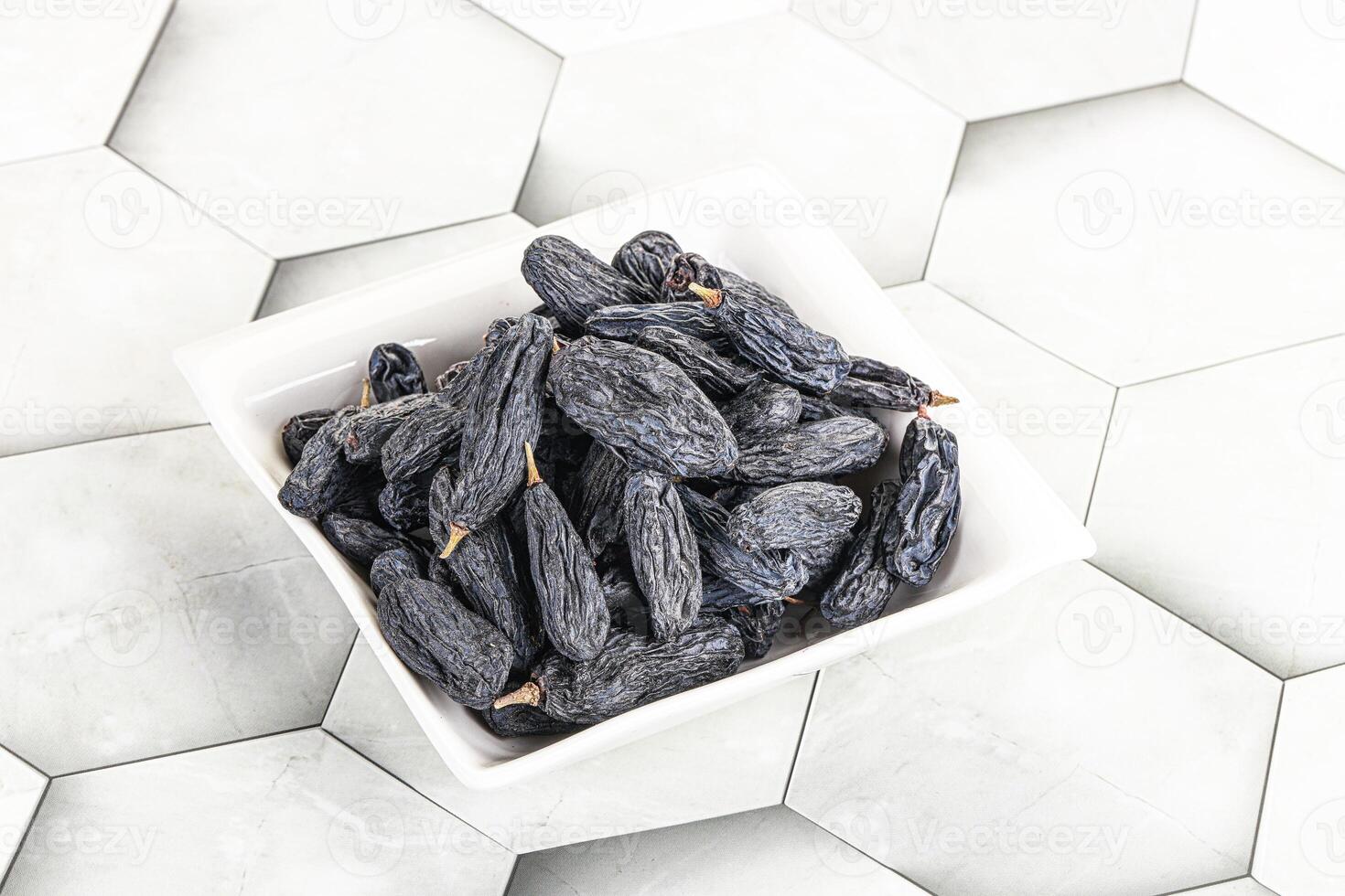 Blue raisin - dry grape berries photo