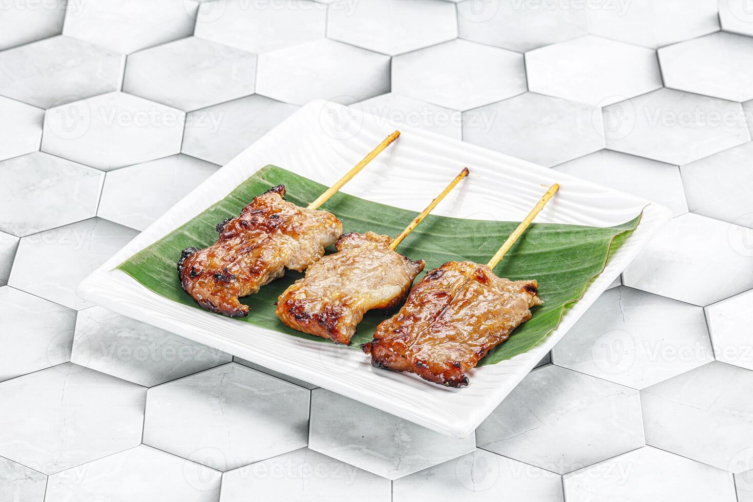Thai cuisine - grilled pork skewer photo