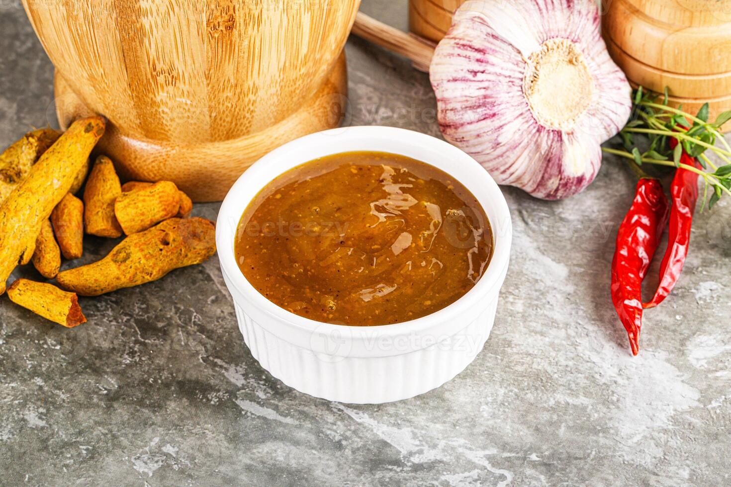 Indian curry sauce in the bowl photo