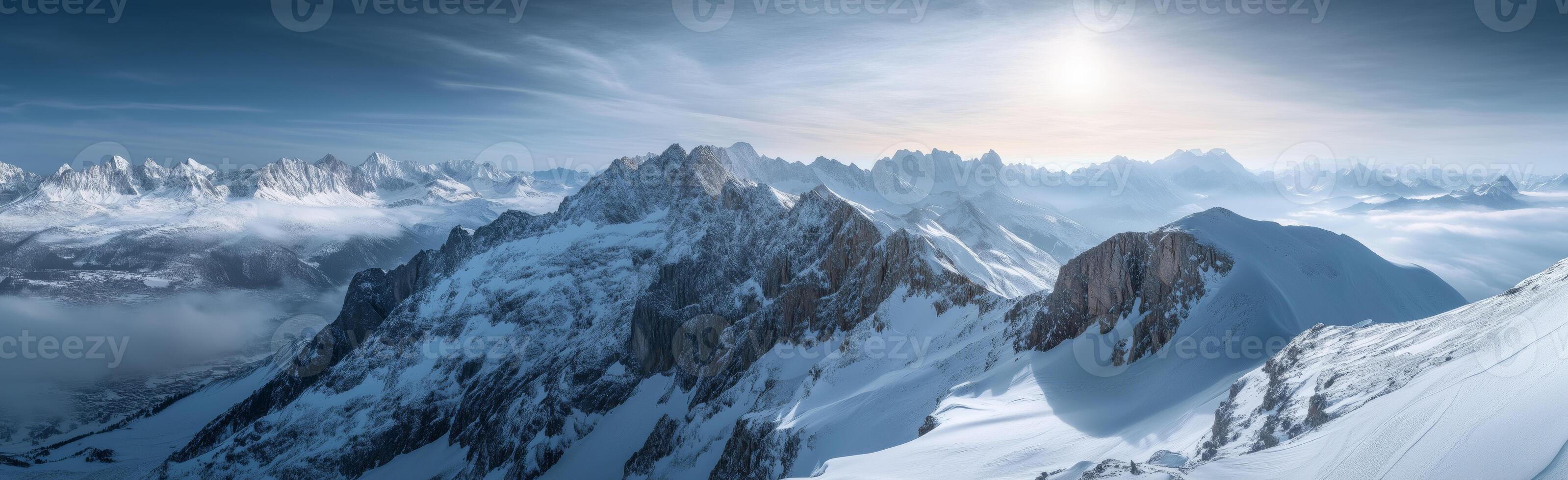 Panoramic aerial view of the snowy mountains photo