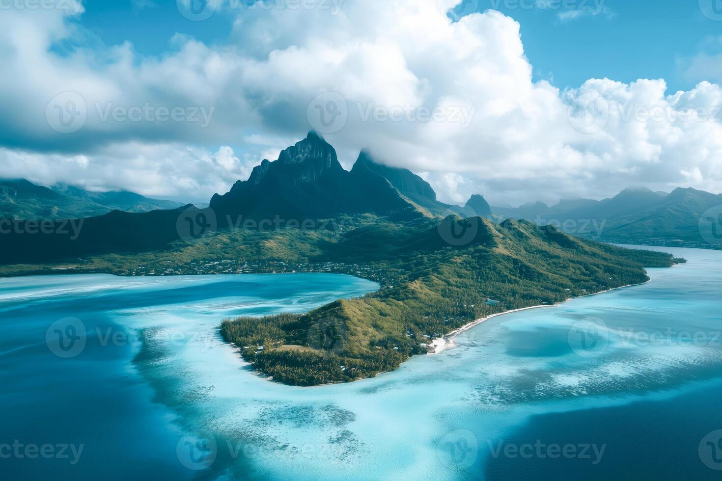 Aerial view of a green tropical island in the ocean photo