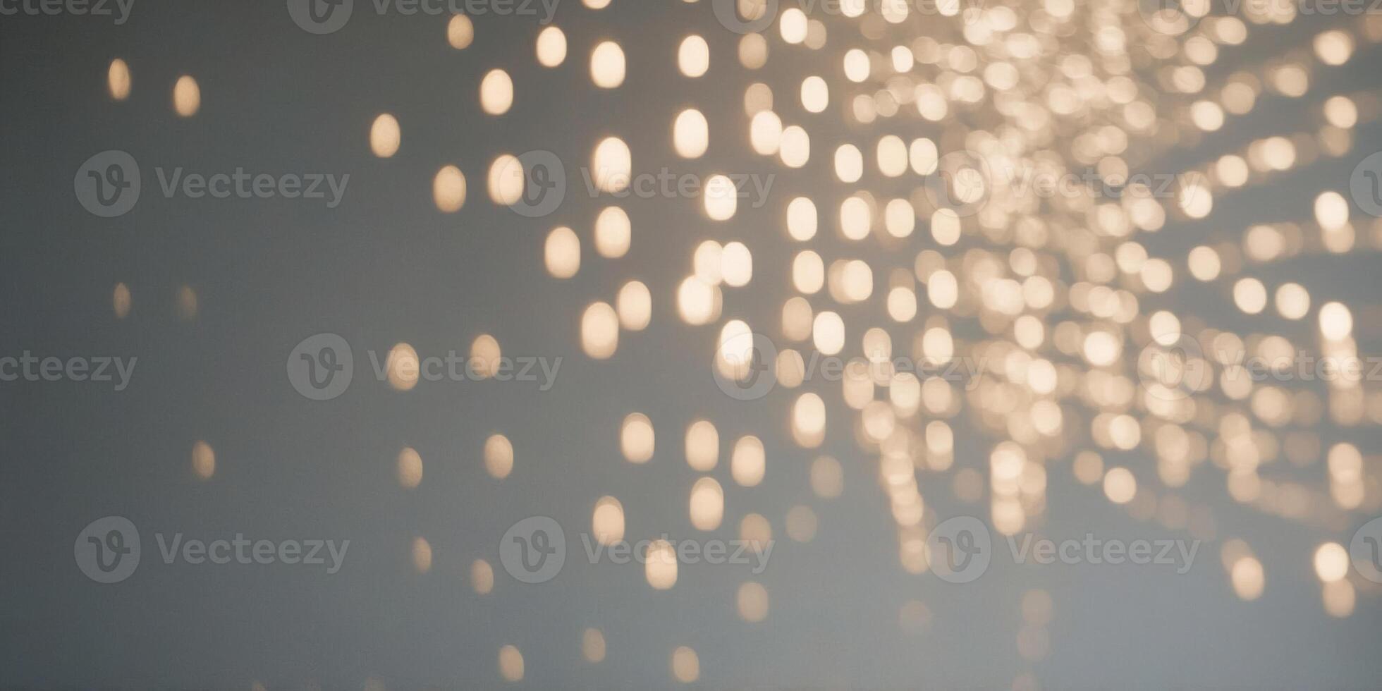 A minimalist composition of morning light casting sharp shadows and bright areas on a simple white wall, creating a play of light and absence. photo