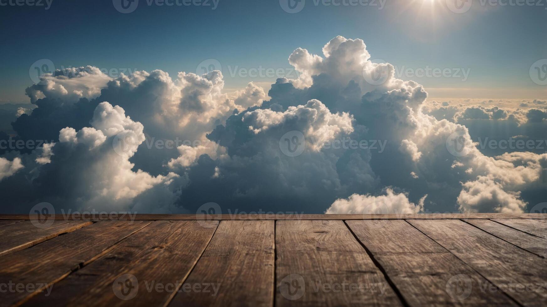 cloud service idea featuring clouds on a wooden surface top view copy space. photo