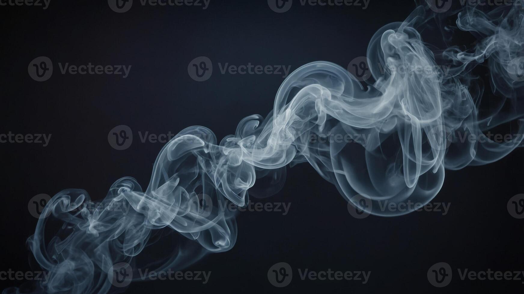 The smoke seems to glow with an otherworldly aura captivating the viewers attention. photo
