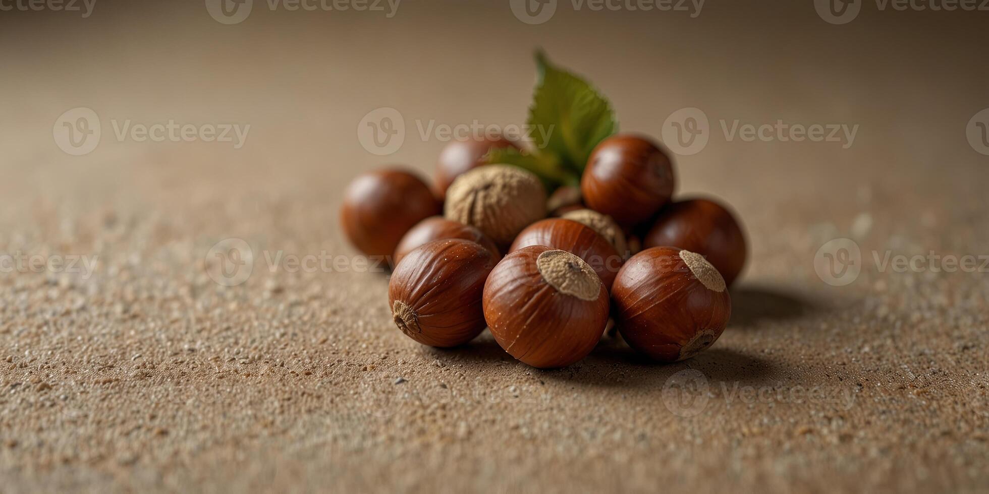 Hazelnuts on a beige background, minimalist composition. photo