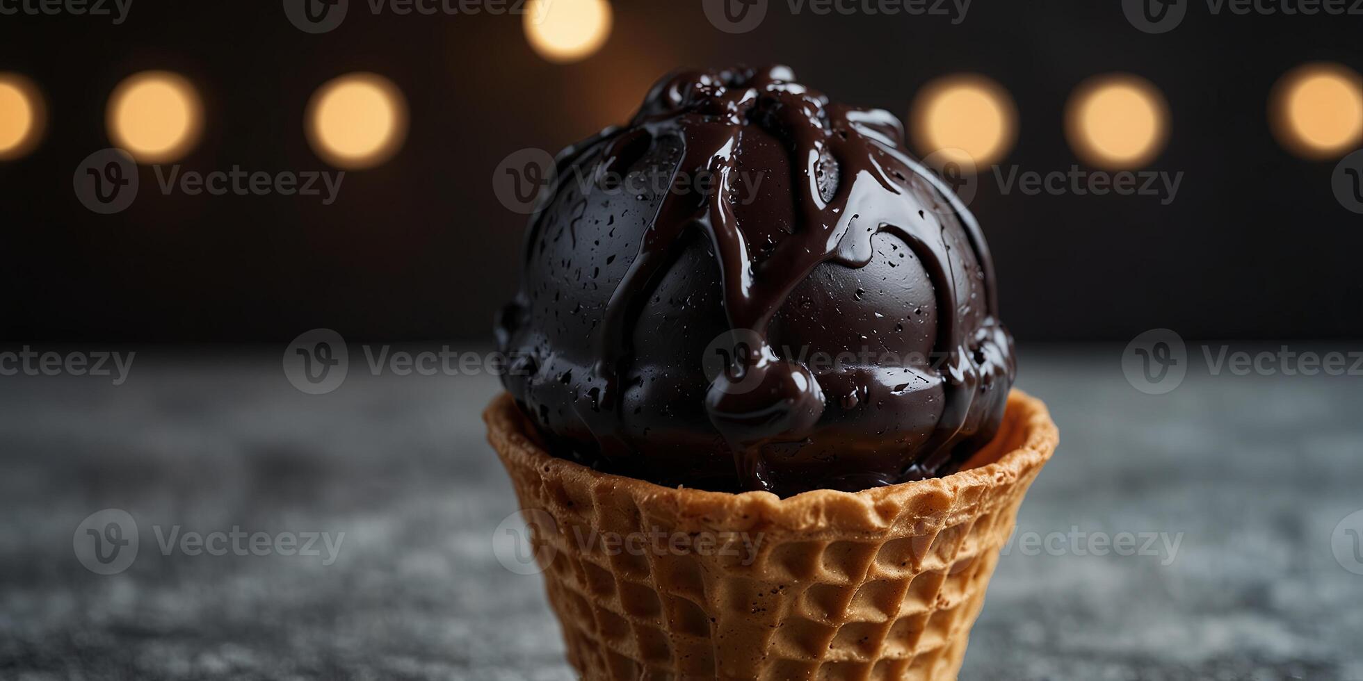 Close-up of black ice cream in waffle cone. photo
