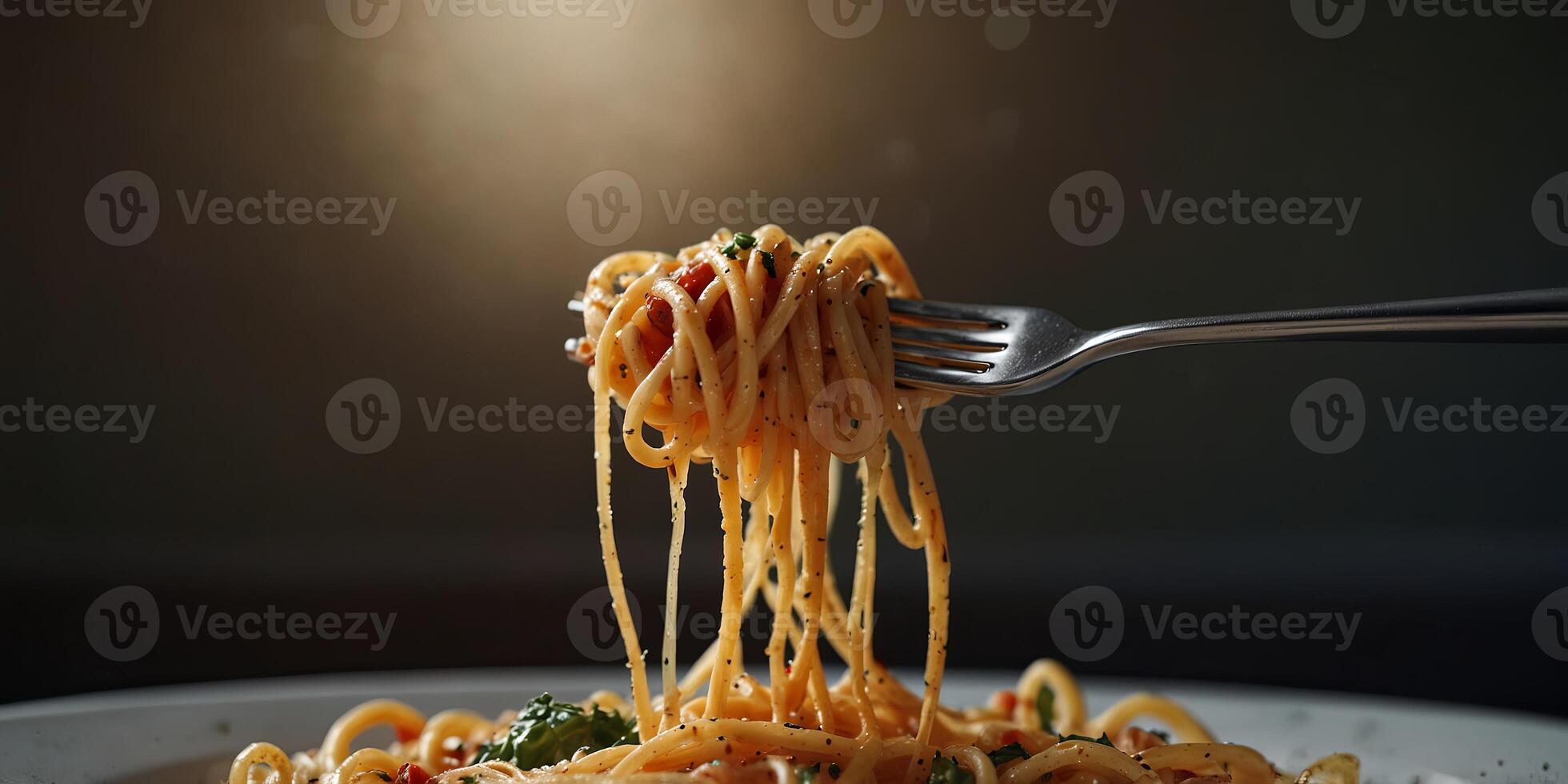 A plate of spaghetti being lifted with a fork. photo