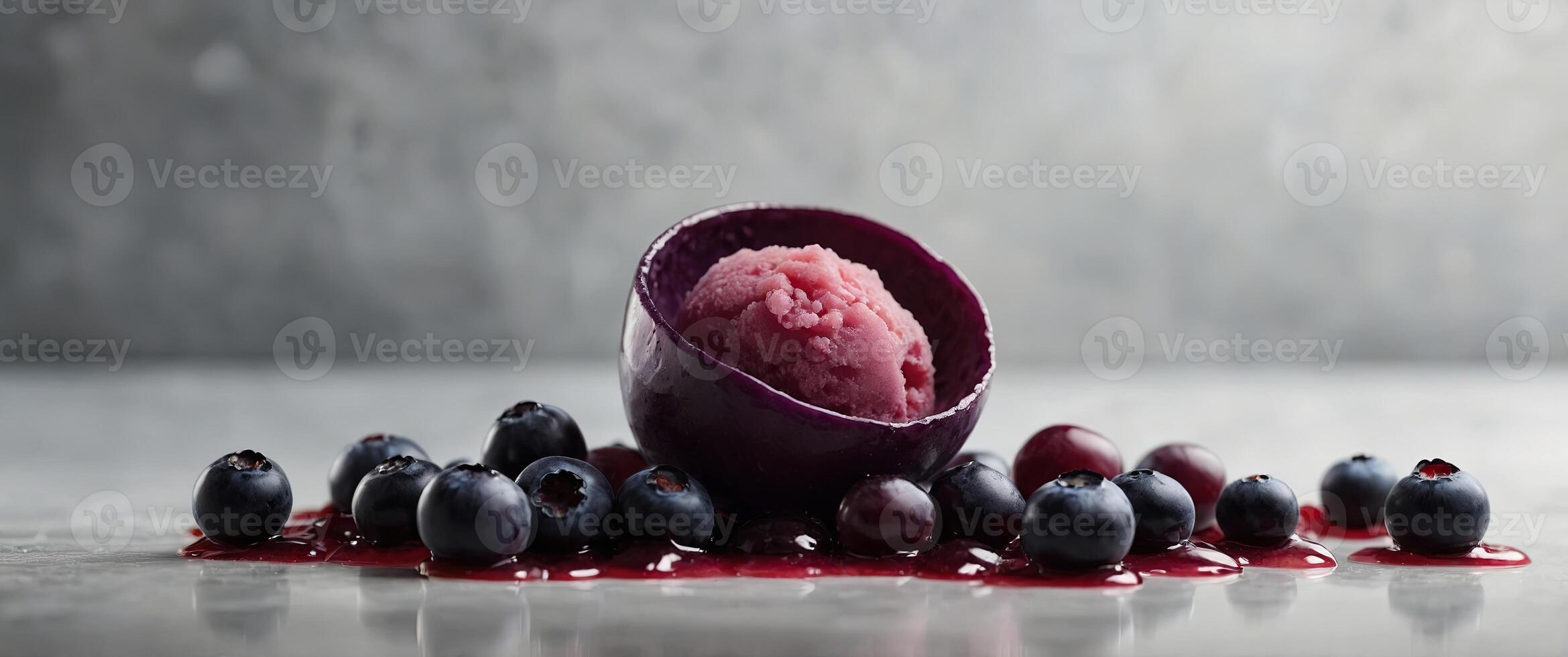 A dollop of smooth sorbet made with foraged chokeberries known for their deep purple color and tart almost citruslike flavor. photo