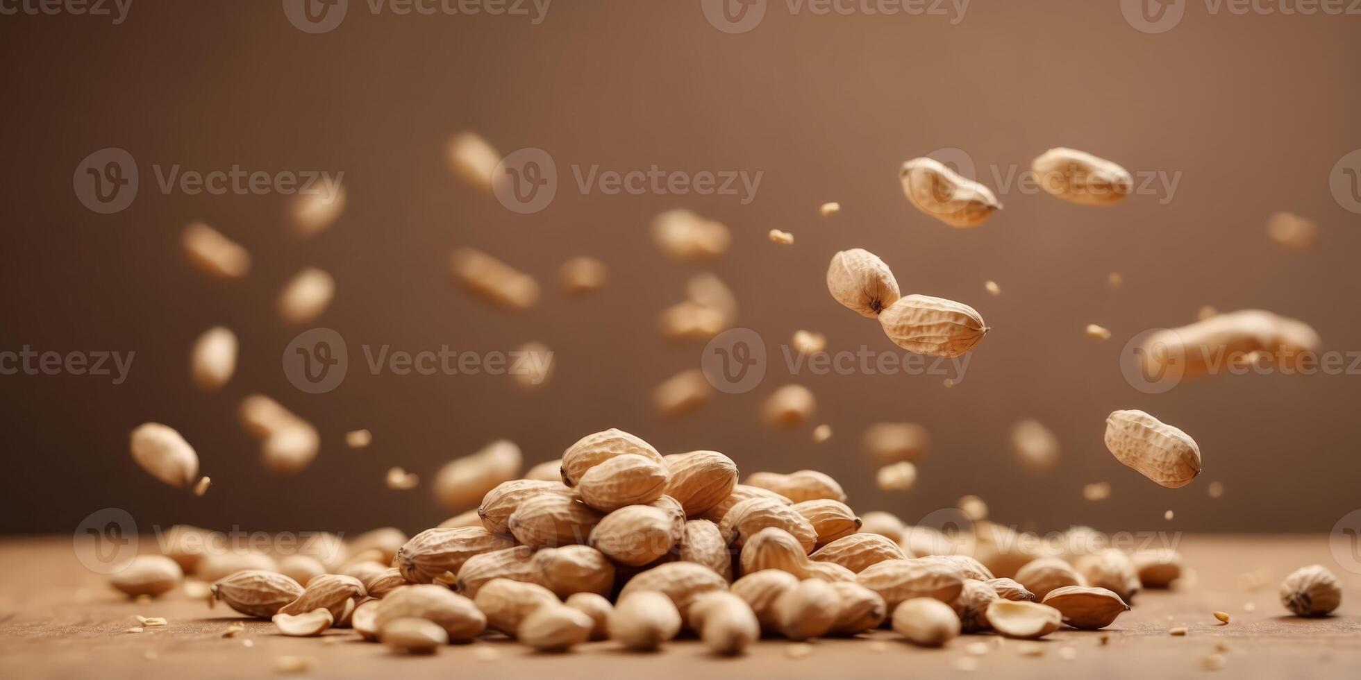 Flying peanuts on beige background Minimal food idea. photo