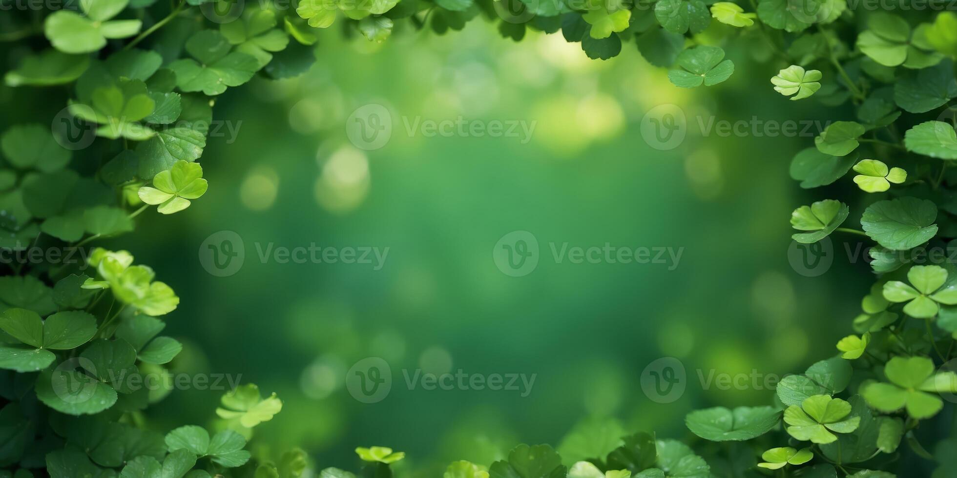 A circular green frame surrounded by a diverse array of clover leaves with varying shades of green,. photo