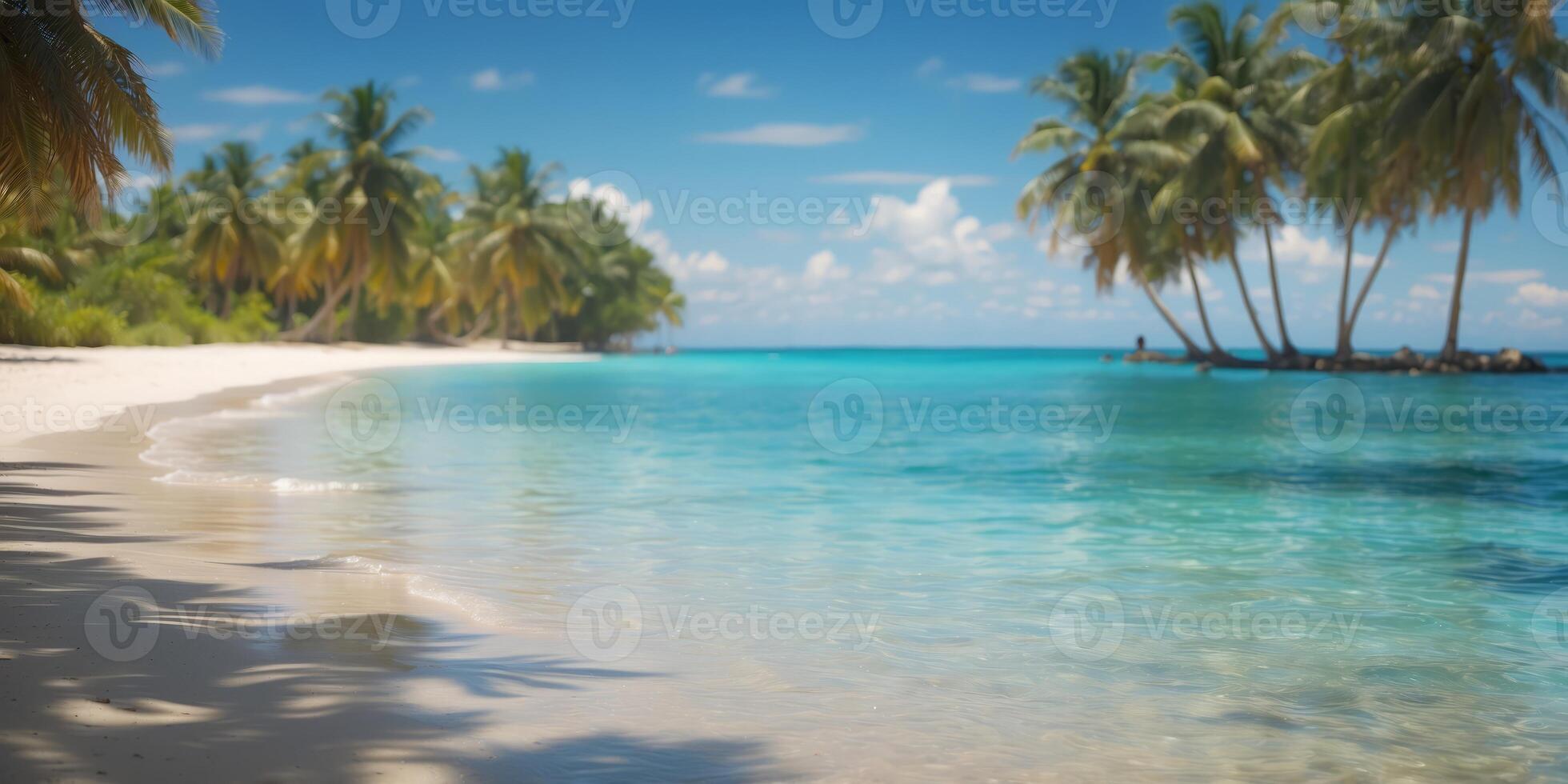 A tropical beach with crystal-clear blue water and palms lining the shore of a secluded island amidst the sea. photo