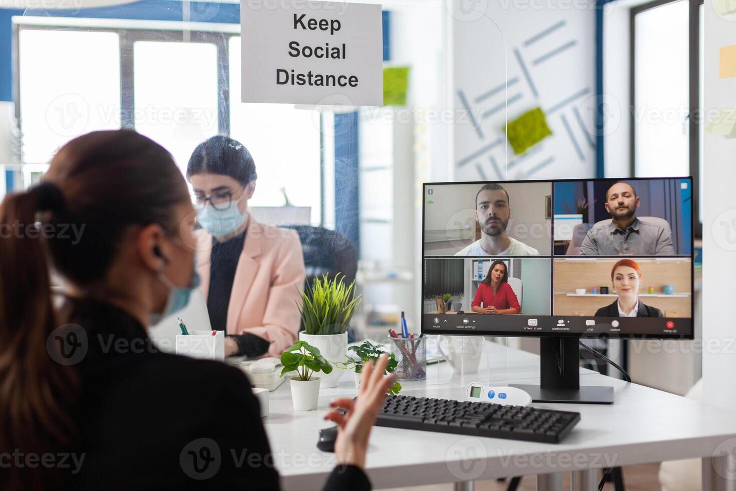 Businesswoman discussing with remote management team during online videocall meeting conference on computer working at marketing presentation in startup company office. Teleconference call on screen photo