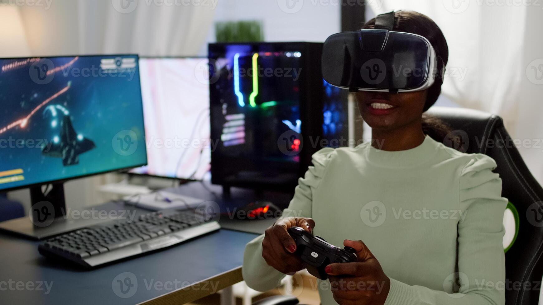 Focused african cyber player wearing virtual reality headset during online championship holding controller. Game over for pro gamer using wireless joystick for space shooter gaming competition photo