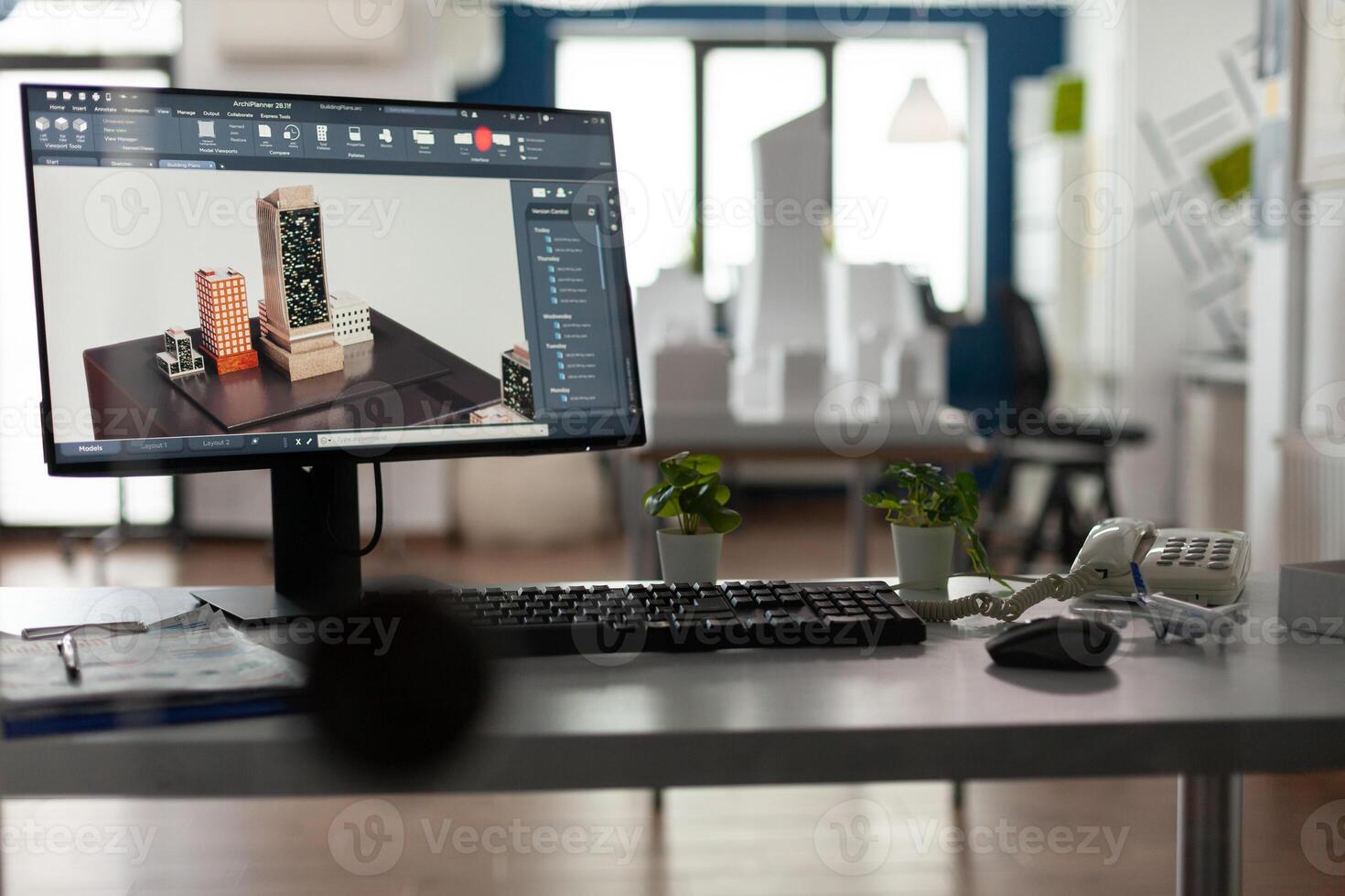 Empty office for architects with computer on desk board blueprint technology equipment. Table for architectural design plan, workplace with notepad tools stationery telephone photo