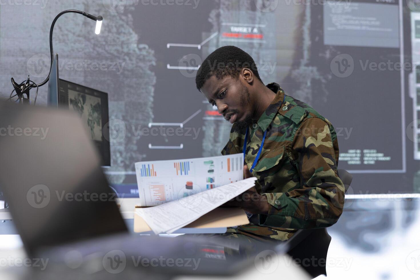 Military team manages cybersecurity operations in a high tech control center base of operations, ensuring data protection and managing surveillance systems, safeguarding national security. photo