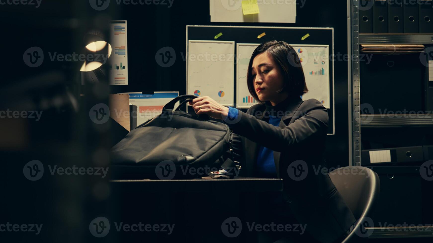 Private agent initiates background checks on individuals associated with archived cases to gather relevant information. After reading legal statements, leaving for field work. Camera B. photo