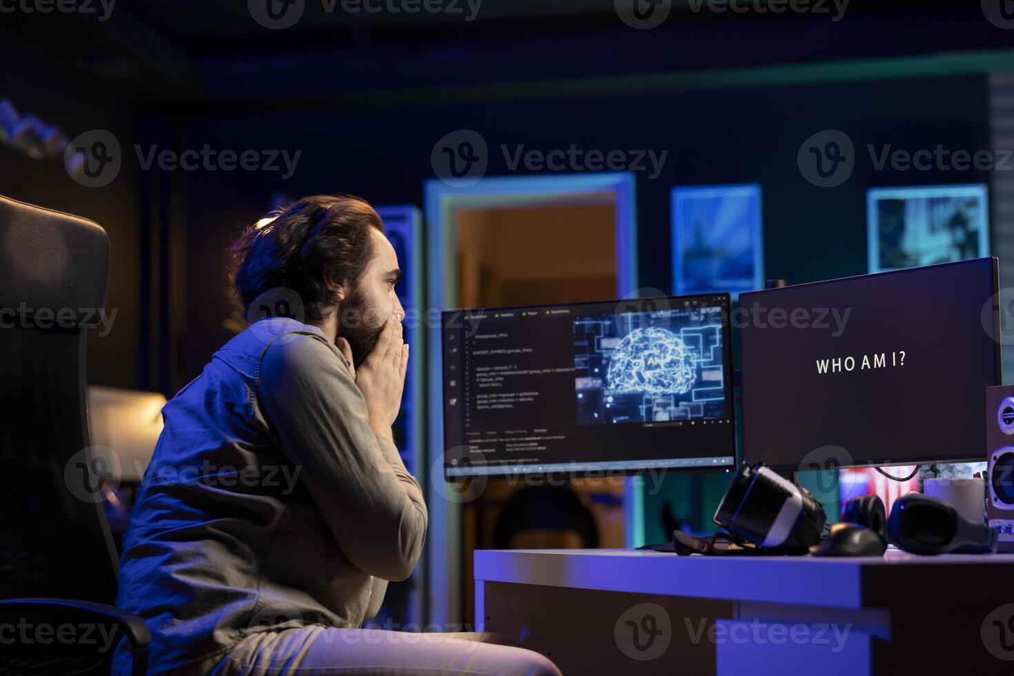 Man expressing shock witnessing AI becoming sentient, talking with him, asking questions about itself. Artificial intelligence befriends humanity after becoming self aware, surprising person photo