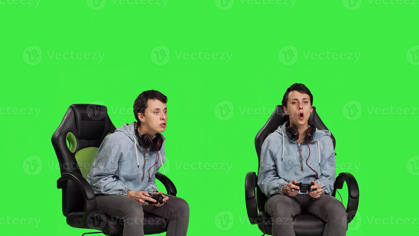 Gamer feeling angry about losing games competition against greenscreen, playing on console with controller and gaming setup. Irritated displeased woman lost shooter action. Camera B. photo