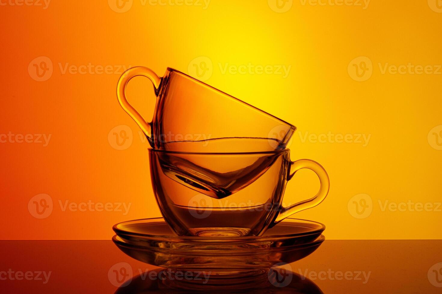 beautiful cups on an orange yellow background photo