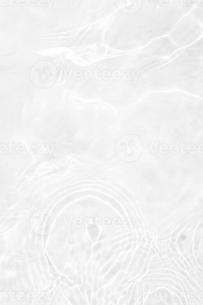 Close-up of Calm White Water with Ripples and Bubbles photo