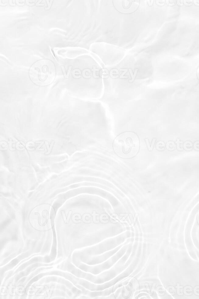 Close-up of Calm White Water with Ripples and Bubbles photo