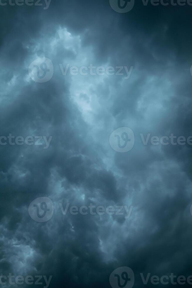 Storm Clouds on dark sky photo
