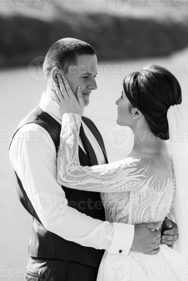 bride blonde girl and groom near the river photo