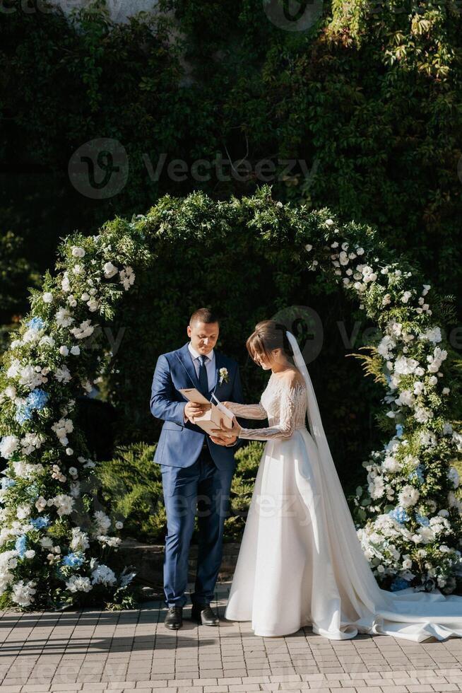 wedding ceremony of the newlyweds on the square photo