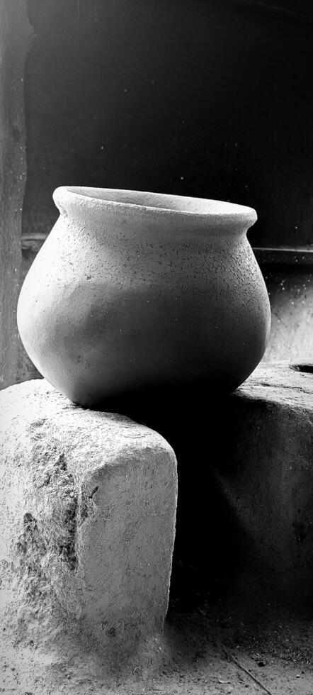 Photo of clay pot used for cooking in wood stove.