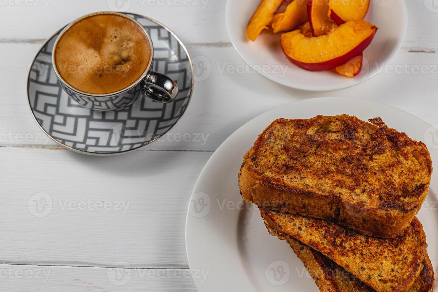 french toast on white plate for breakfast photo