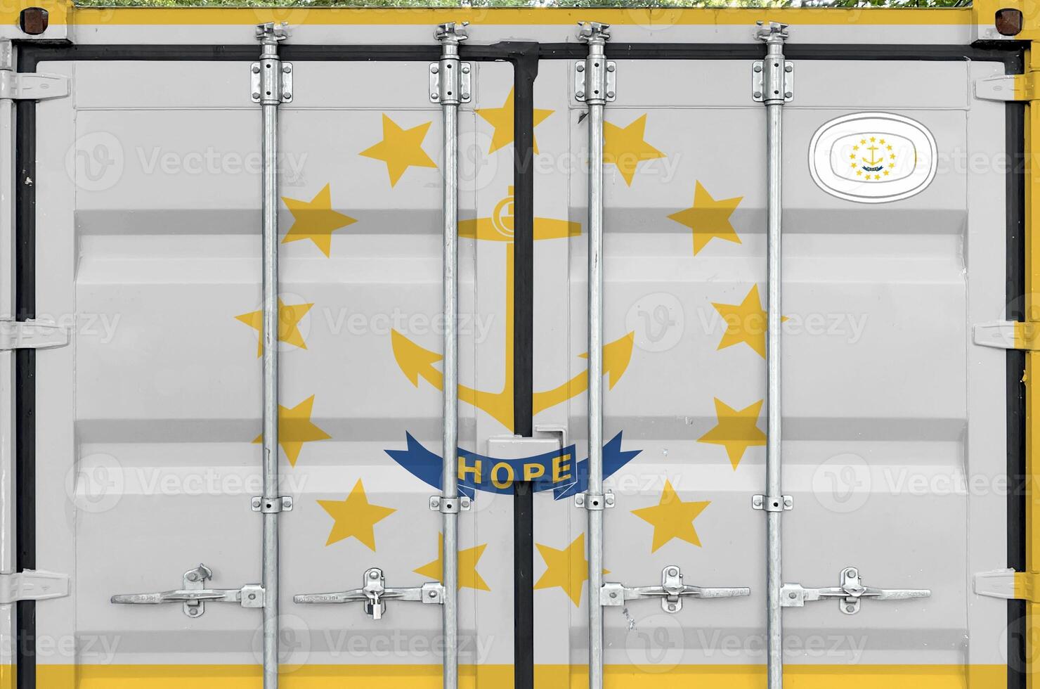 Rhode Island US state flag depicted on metal doors of shipping cargo container outdoors in docks area photo