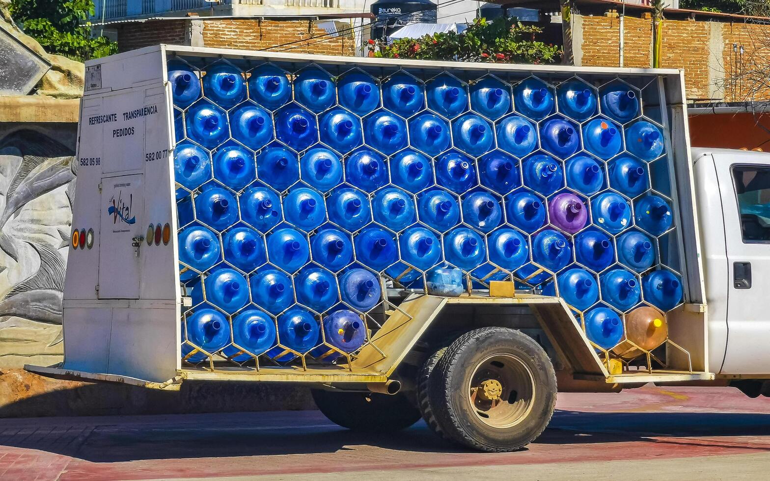 Puerto Escondido Oaxaca Mexico 2023 Water delivery by car truck in Zicatela Mexico photo