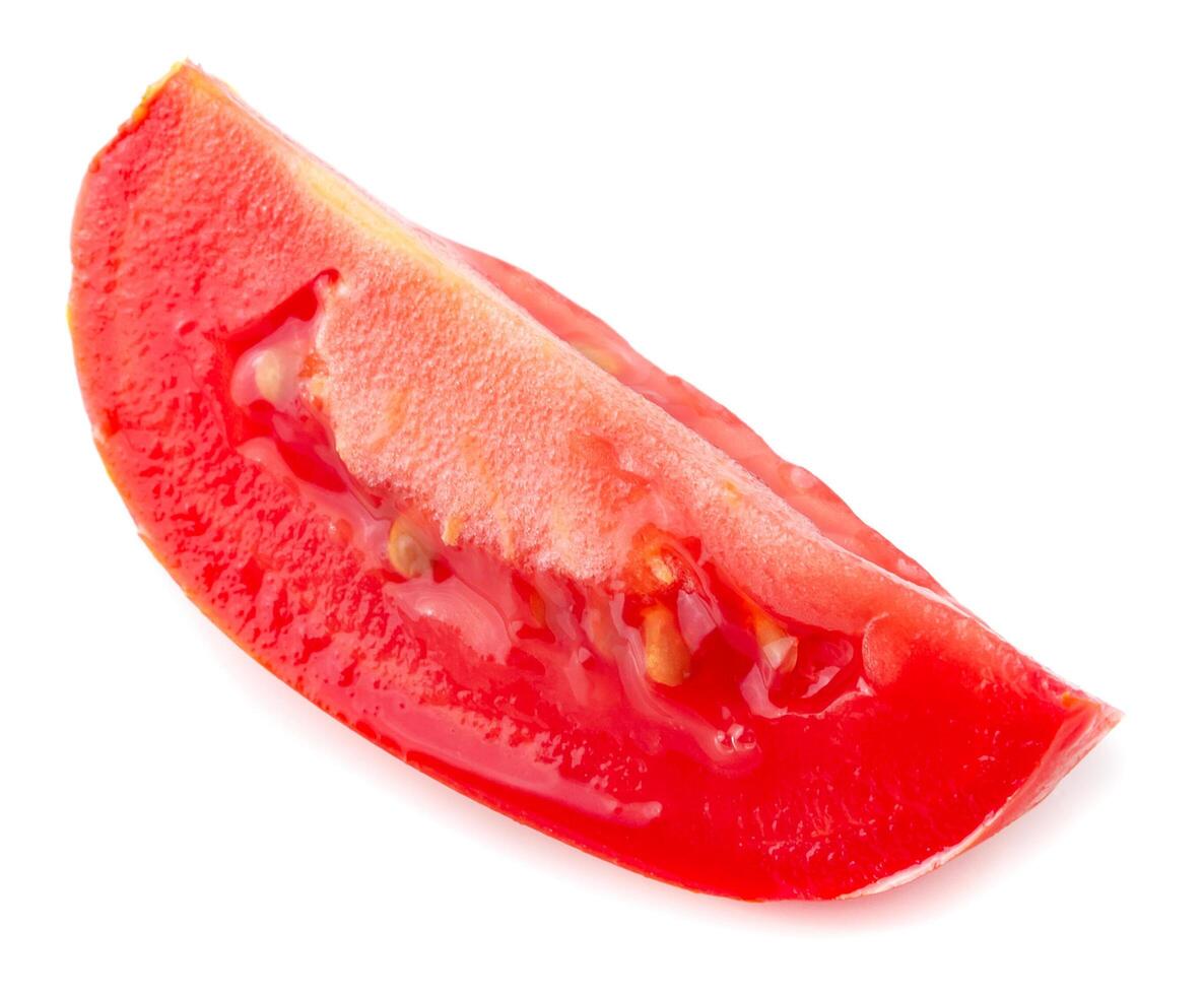 Tomato slice isolated over white background photo