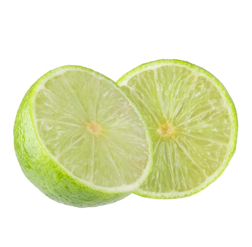 Whole and sliced limes, Sour green fruit isolated on alpha background. photo