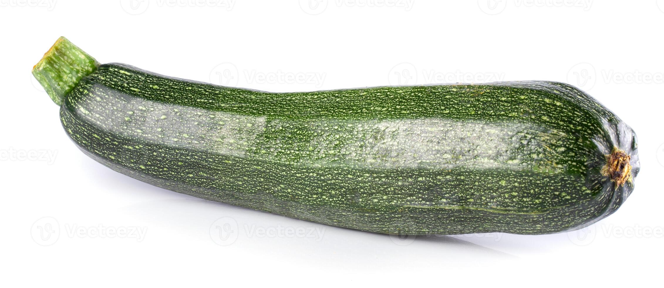Fresh green zucchini isolated on a white backgrond photo