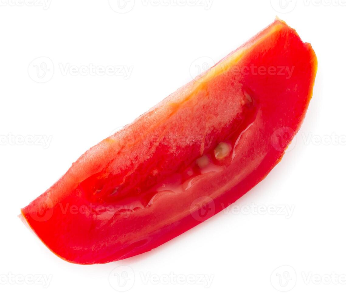 Tomato slice isolated over white background photo