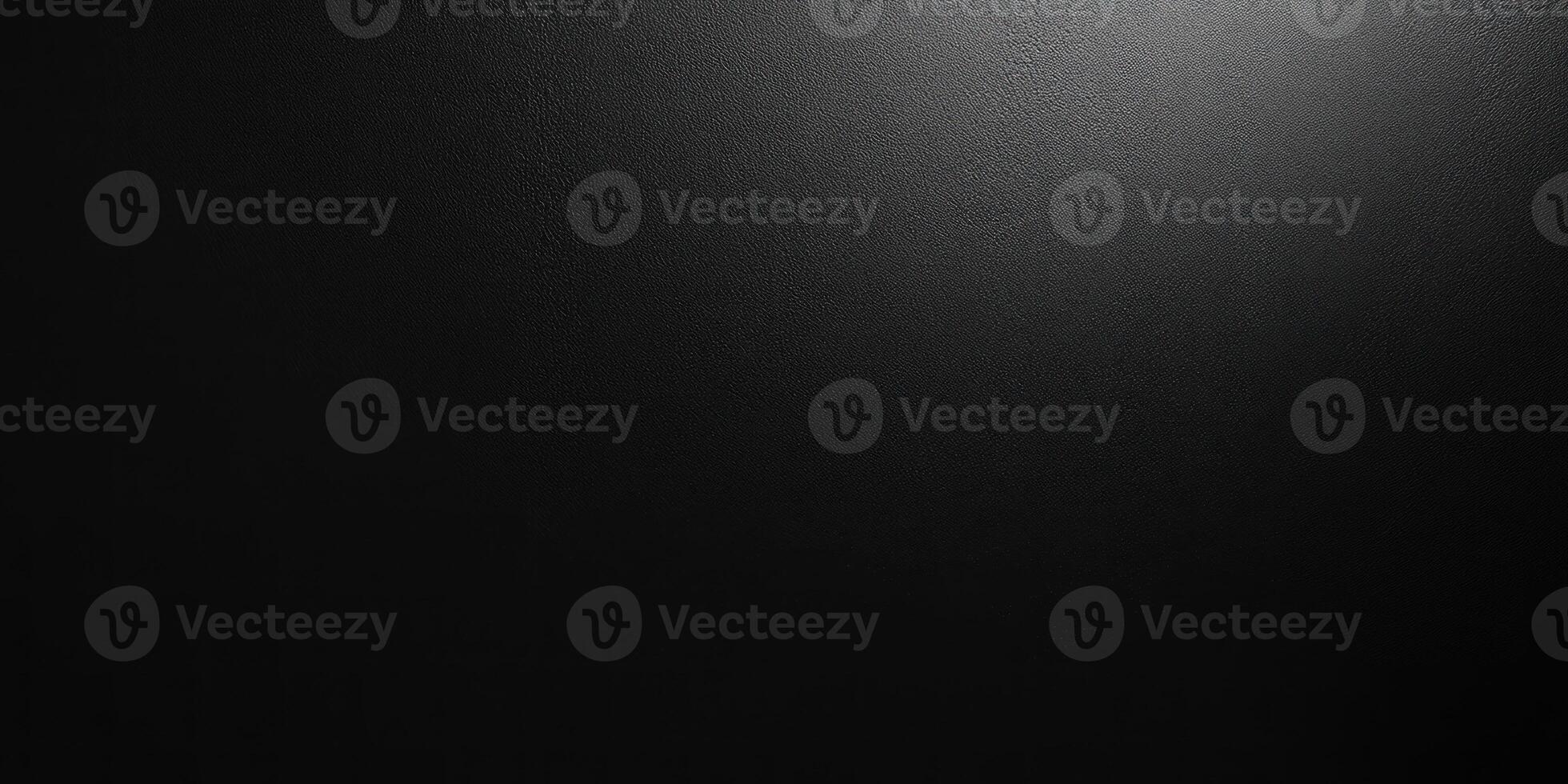 Textured Black Surface with a Light Source photo