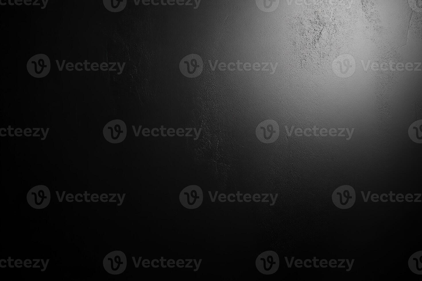 A Dark, Textured Surface with a Spotlight photo