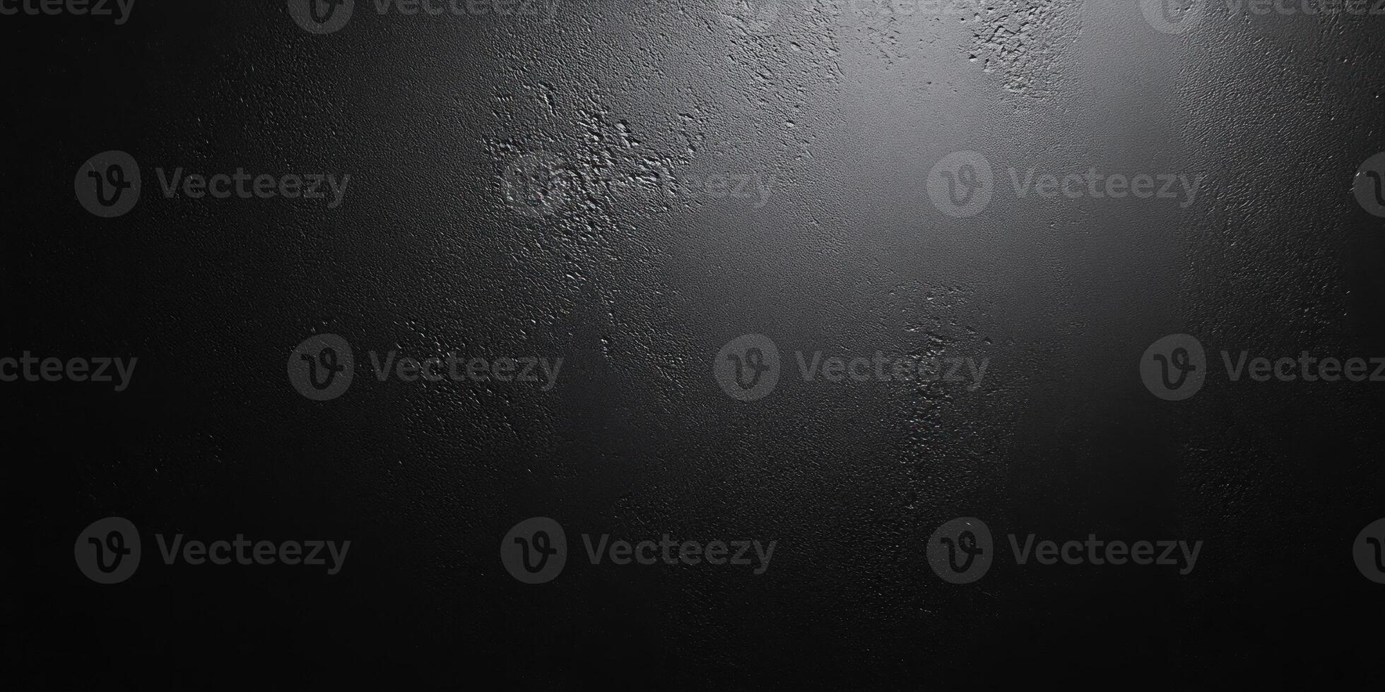 Close-up of a Dark Textured Surface with a Spot of Light photo