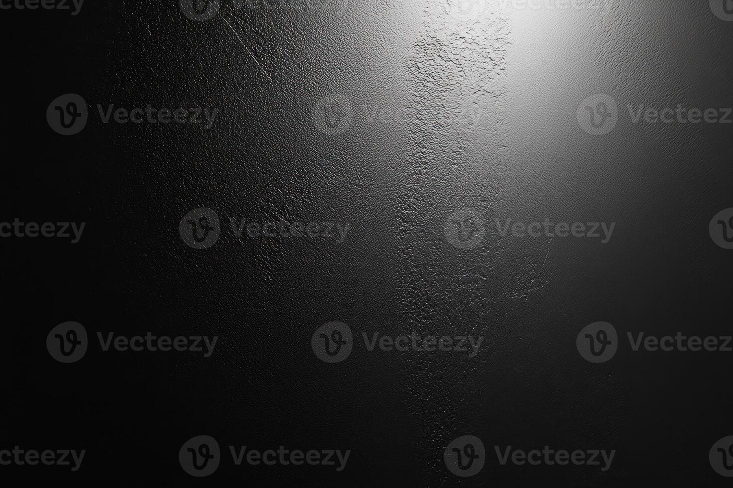 Black Textured Surface with Light Source photo