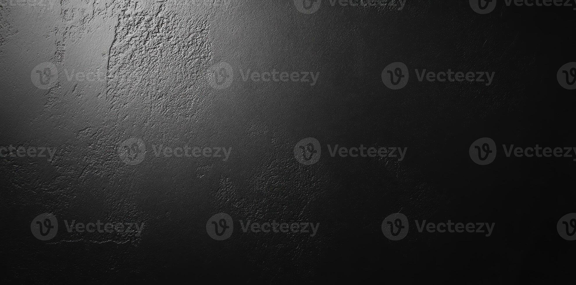 A Dark, Textured Surface With Subtle Lighting photo