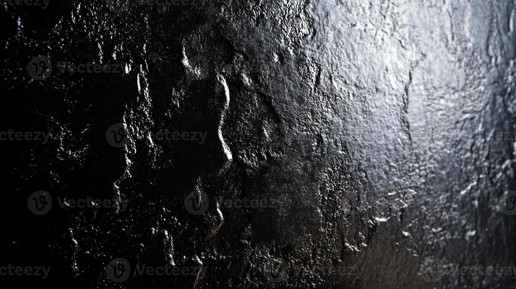 Black Textured Surface With Glimmering Light photo