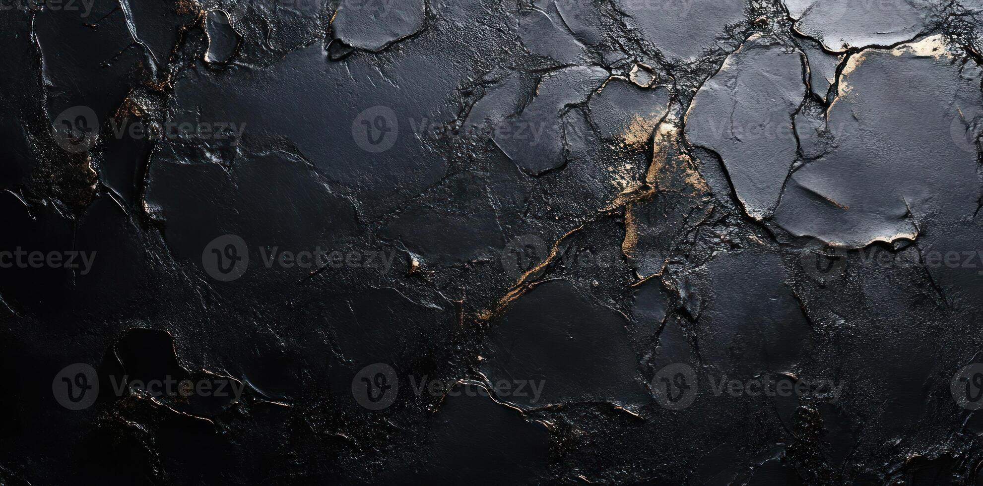 Black and Gold Textured Surface with Abstract Patterns photo