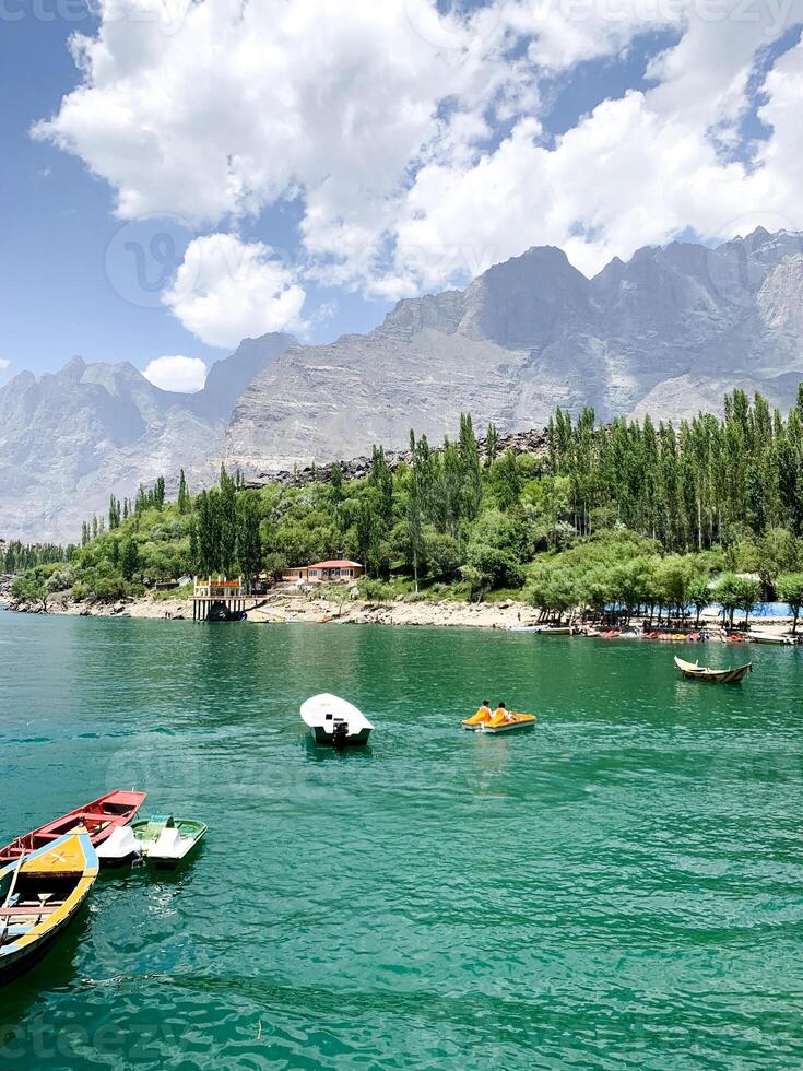 A view of Dal Lake in winter, and the beautiful mountain range in the background in the city of skardu , India. Suitable for banners, posts, social media, news, background. photo