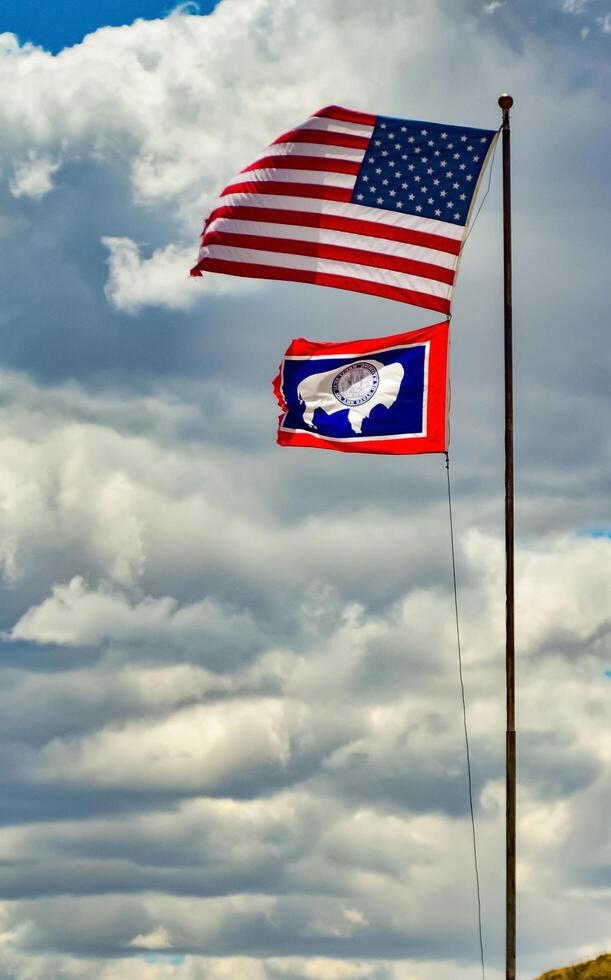 USA, Wyoming - 06 MAY 2018 - Flag of United States and Wyoming State, US photo