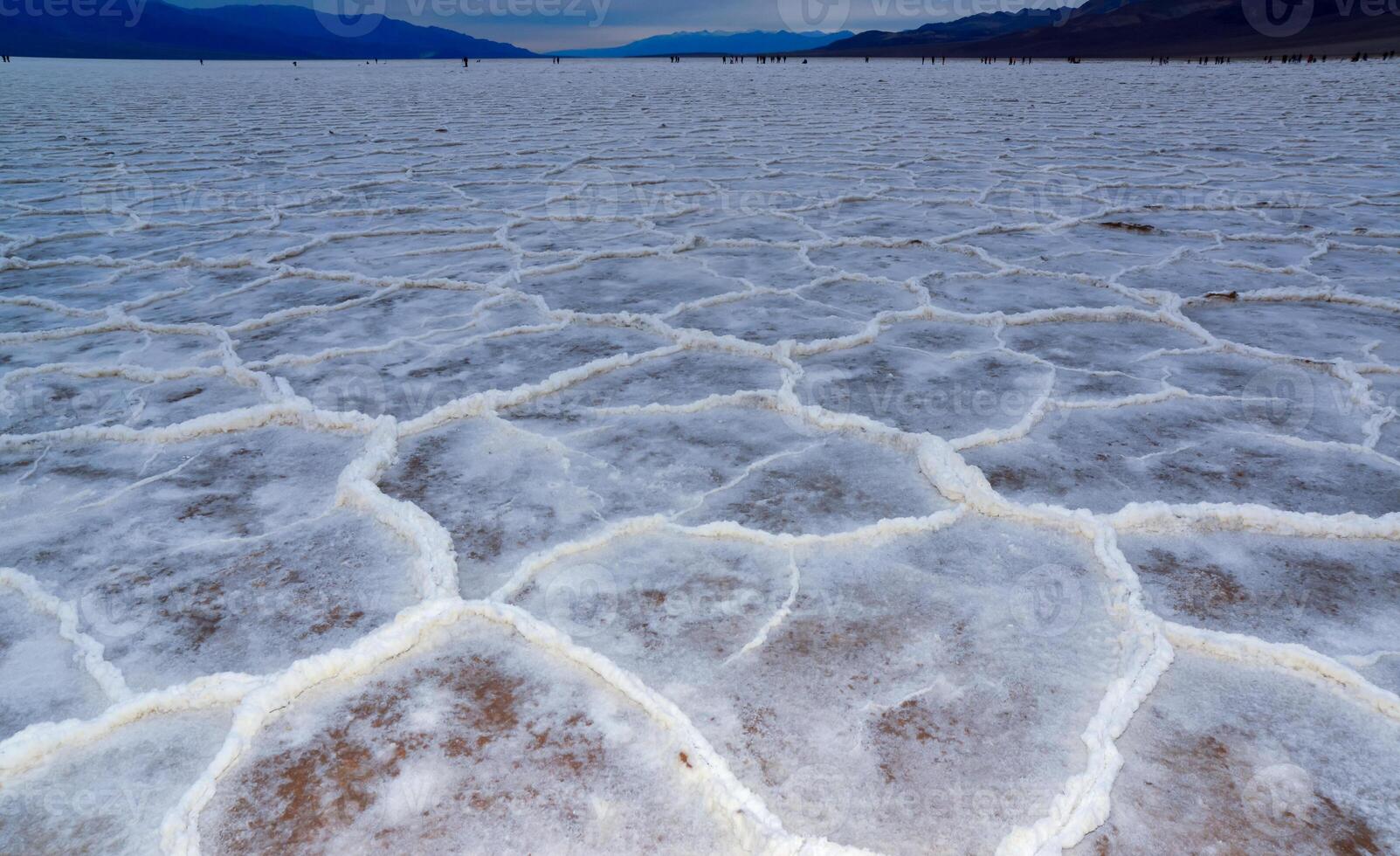 Death Valley National Park, Salt with clay, California. Smooth salt valley with cracked and swollen salt, dead salt landscape photo
